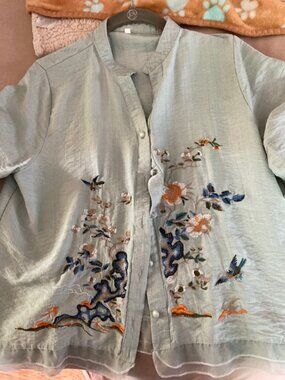 Embroidered light green crinkled gauze top